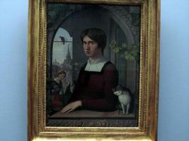 The painter Franz Pforr in profile, with cat at his side