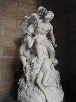 Sculpture of man and woman at gallery entrance