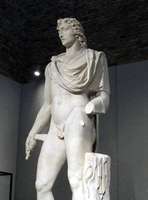 Large statue of Helios (sun god) in Greek style