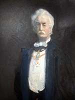 Man with white hair and moustache