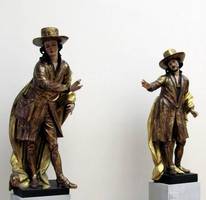 Painted sculpture of female and male saints