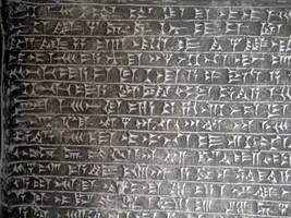Detail of cuneiform writing on sculpture of mythical creature