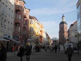 View down street in Spandau, church in background