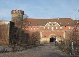 Long view of fortress; tower at left