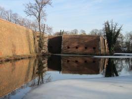 Half-frozen moat outside of fortress