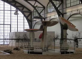 Large sculptured mushrooms in center of installation.