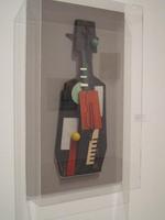 Figure of a man made to look like a musical instrument