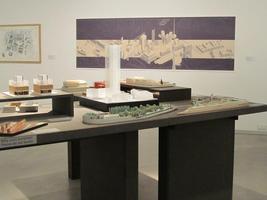 Table with small models of proposed projects for building updates