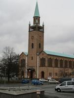 Brown brick church w. deeper red brick horizontal stripes