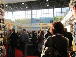 Crowd looking at display of 5,000 German beer brands