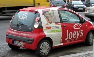 Mini Smart Car for “Joey's - think pizza”, with pizza in form of a thought balloon