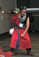 warrior in red outfit with huge sword