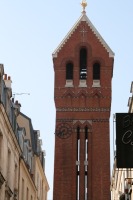 long view of red brick church