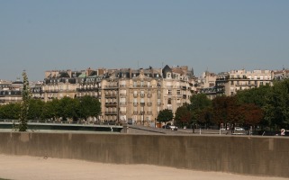view of buildings across river