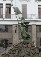 side view of woman holding flag
