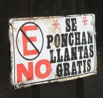 placard on garage wall