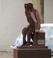 statue of man and woman in embrace