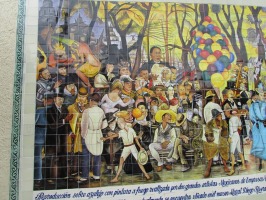 mural painted on tiles; central item is a set of balloons