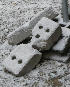 snow covered bricks that look like a face