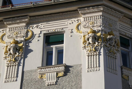 relief sculptures on building corner