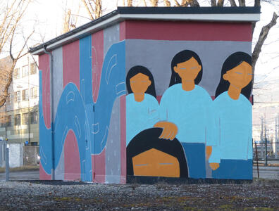 painting of four women on side of shed