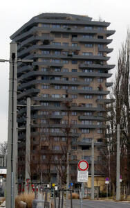 Apartment building with irregularly vertically spaced balconies