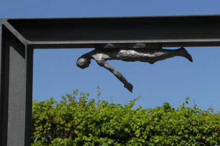 figure at top of frame