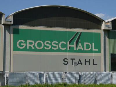 Grosschädl Stahl logo with the H having a 3-d effect like a steel I-Beam