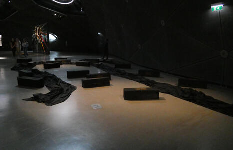 black cloth and blocks on floor