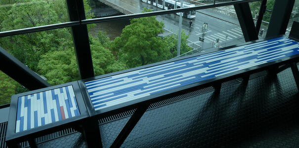 bench with blue and white striped panels