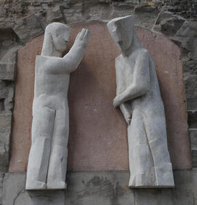 Abstract sculpture of Jesus blessing a person