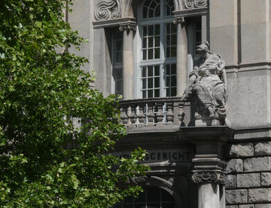 statue of woman atop column