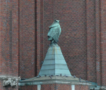 bronze owl with green patina