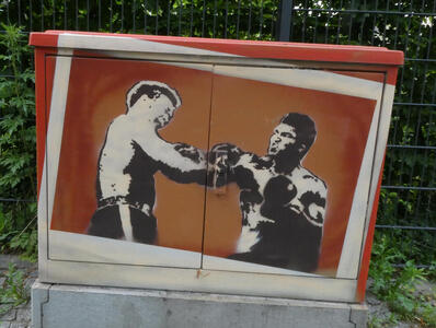 utility box with painting of Muhammad Ali