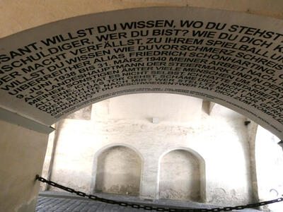 archway with text painted inside arch