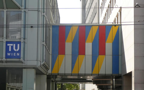 Colorful walkway connecting two buildings at TU Wien