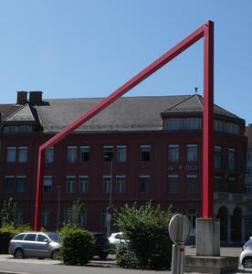 red trapezoidal sculpture