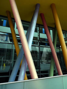 multicolored building support columns set at 60 and 120 degree angles.