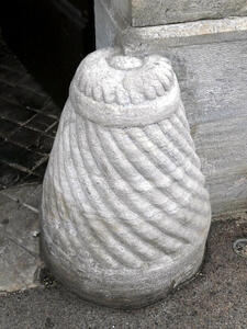 bulb shaped base of post with spiral grooves