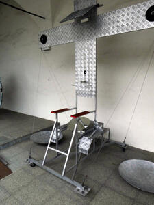 abstract metal chair with mirror where seat should be