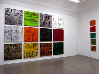 array of abstract paintings