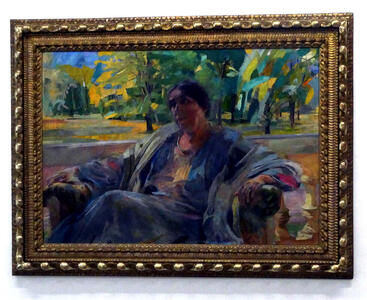 woman seated in armchair