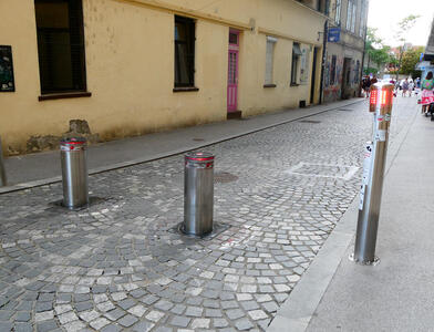 Traffic stanchions raised; now showing red lights