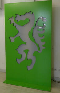 Large plexiglass frame with Steiermark symbol cut out of it