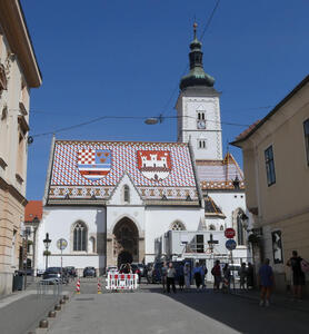 Church at St. Mark’s Square (Trg Sv. Marka). The roof has colored tiles that form the coat of arms of Zagreb and the coat of arms of Croatia