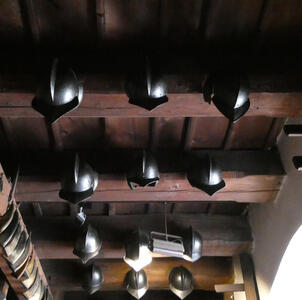 helmets mounted on ceiling beams