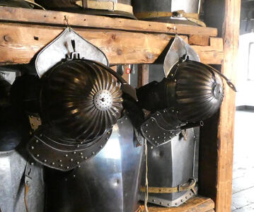 Ornate metalwork on helmets