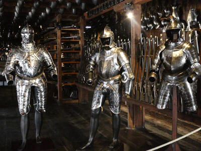 Suits of armor with very fancy metalwork decoration