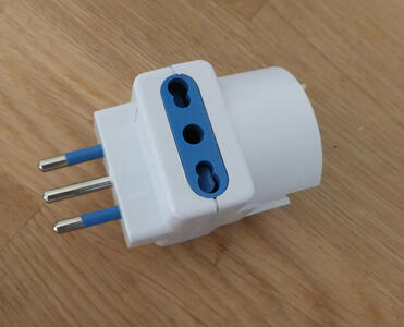 Adapter for ordinary universal European socket to Italian three-prong plug