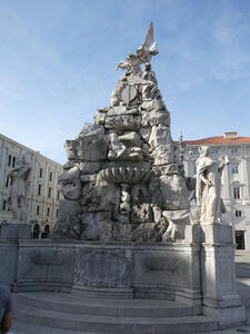 Statue/fountain which looks like a large pile of stacked rocks